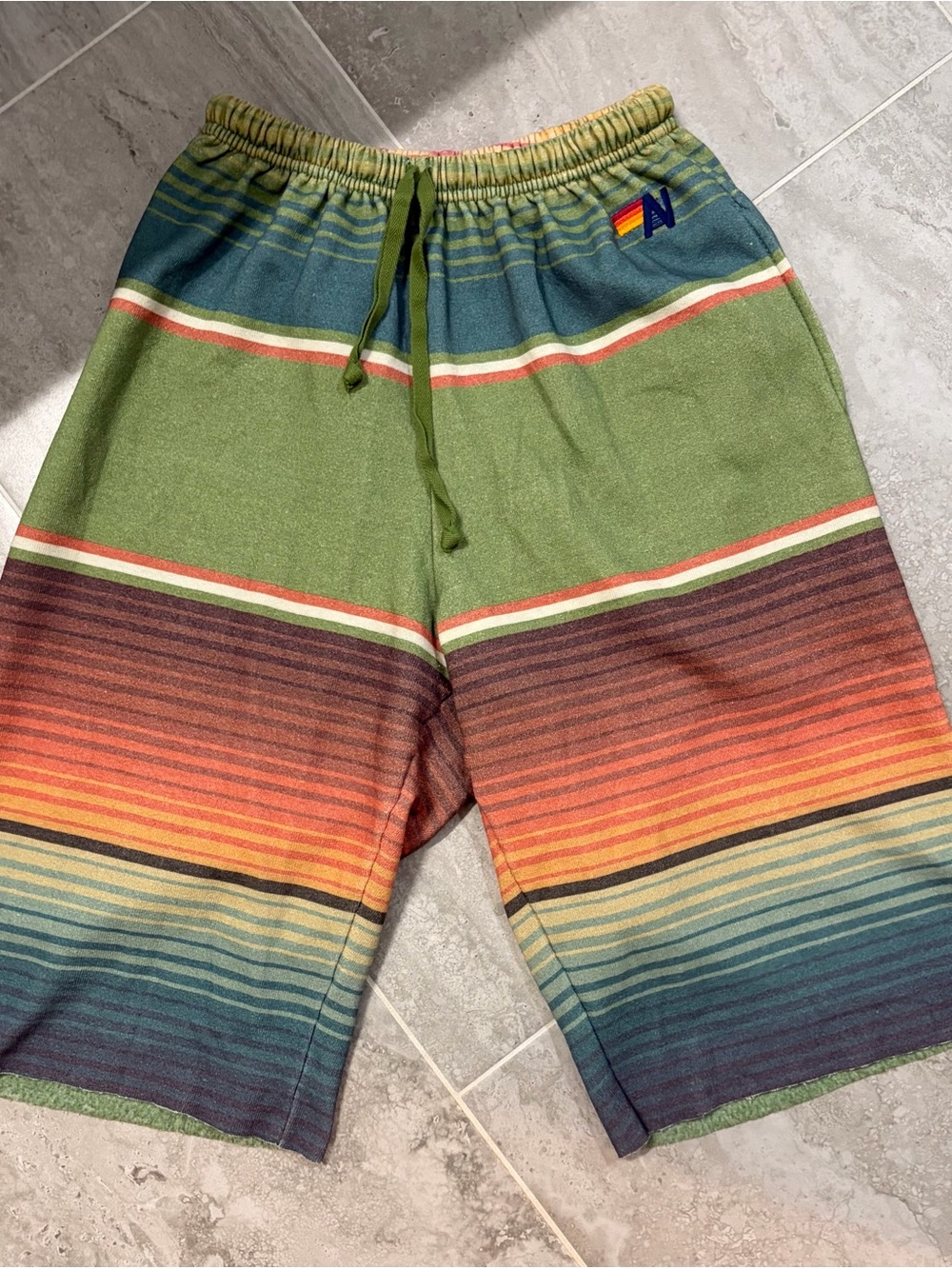 Aviator Nation Serape Tulum Sweat Shorts. Green Retro Striped